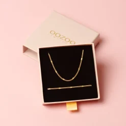 Goudkleurige armband + ketting set met klassiek detail