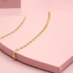 Goudkleurige armband + ketting set met hartjes