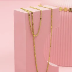 Goudkleurige armband + ketting set met klassiek detail