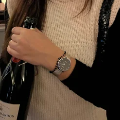 Goudkleurige armband met zwarte kraaltjes