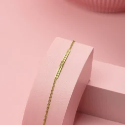Goudkleurige armband met strass steentjes