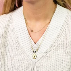 Goudkleurige ketting met een klaver