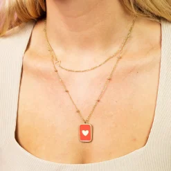 Goudkleurig/rode ketting met een hart plaatje