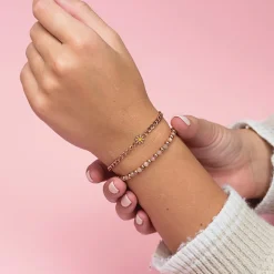 Rosé goudkleurige armband met roze natuursteentjes