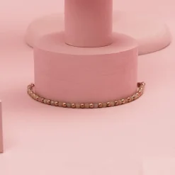 Rosé goudkleurige armband met roze natuursteentjes