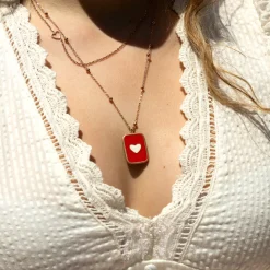 Rosé goudkleurig/rode ketting met een hart plaatje