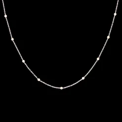 Rosé kleurige armband + ketting set met bolletjes