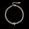 Rosé kleurige armband met taupe hart bedeltje