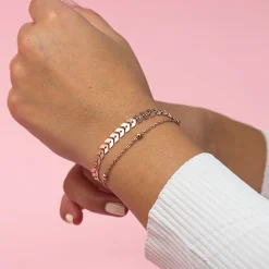 Rosé kleurige armband met bolletjes