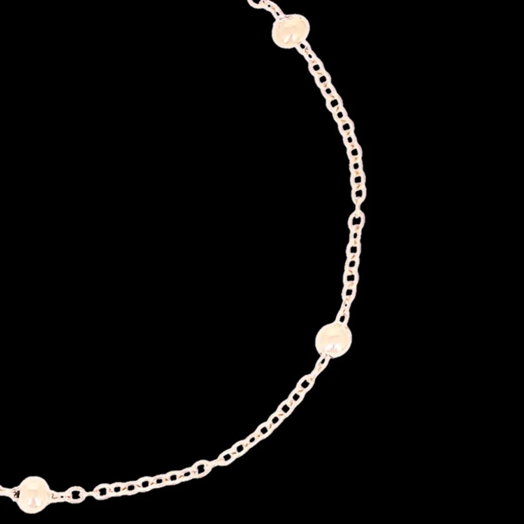 Rosé kleurige armband met bolletjes
