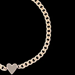 Rosé kleurige armband met taupe hart bedeltje