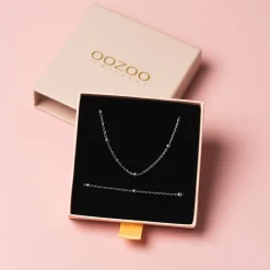 Zilverkleurige armband + ketting set met bolletjes