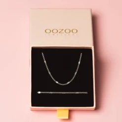 Zilverkleurige armband + ketting set met klassiek detail