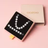 Zilverkleurige armband + ketting set met smileys