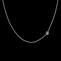 Zilverkleurige armband + ketting set met een groene klaver