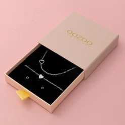 Zilverkleurige armband + oorbellen + ketting set met een hart