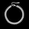 Zilverkleurige armband met V-schakel