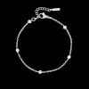 Zilverkleurige armband met bolletjes