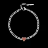 Zilverkleurige armband met rood hart bedeltje