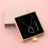 Zilverkleurige oorring + ketting set met een hart plaatje