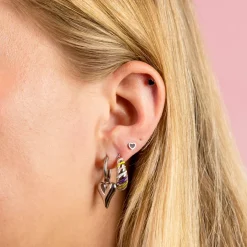Zilverkleurige oorringen met hart bedeltje