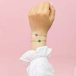 Zilverkleurig/groene armband met een klaver